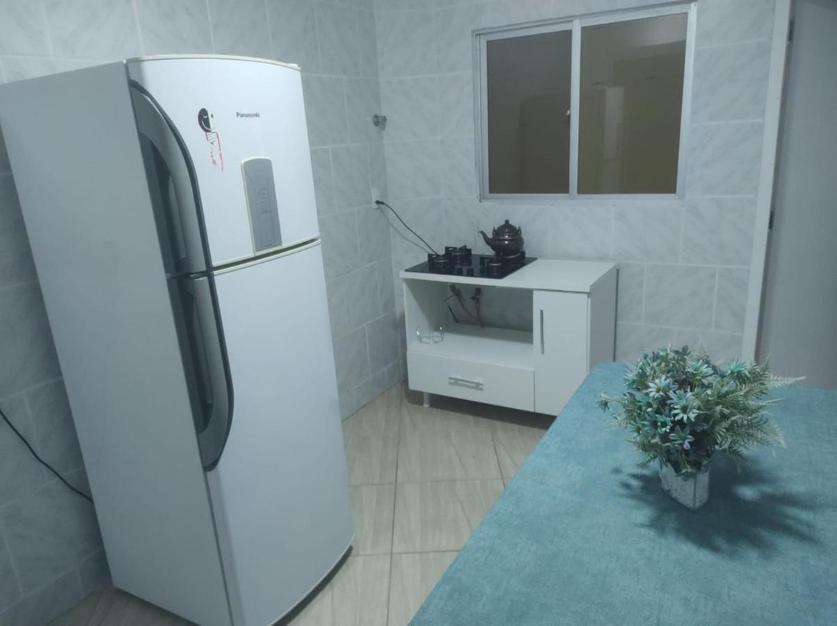 Apartamento amplo pé na areia - Itapema 180m da Praia Exterior foto
